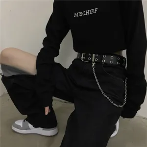 Punk style black double grommet leather belt with metal chain detail, streetwear accessory.
