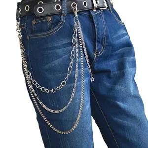 Metal pants chain detail showing multi-layer hip hop chains with star charm and punk style.