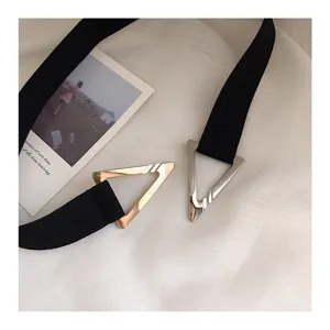 Black elastic belt with metal triangle buckle, stylish waist-cinching accessory for dresses.