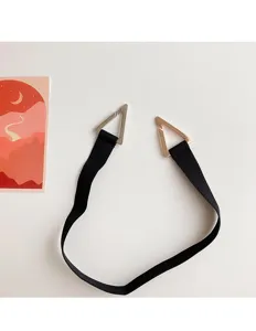 Black elastic coat belt featuring unique metal triangular buckles for a stylish waist look.
