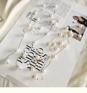 Elegante parelketting taille riem voor dames, slanke jurk riem, chique zomer accessoire.