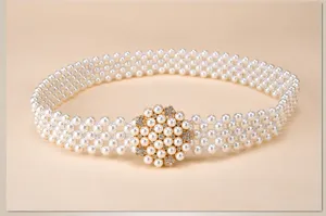 Elegant women pearl belt with sparkling rhinestone buckle, perfect fashion accessory for dresses.