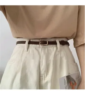 Retro thin leather belt for women, simple versatile metal buckle strap for jeans and dresses.