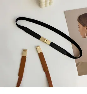 Ceinture fine élastique pour femme avec boucle en métal, accessoire de taille élégant.