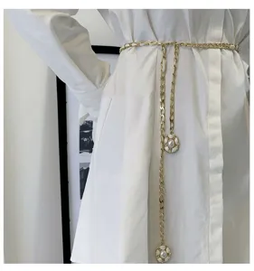 Gold chain belt for women, interlocking camellia flower pearl pendant waist accessory.