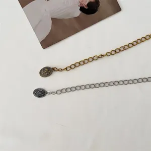 Vintage retro metal chain belt for women, stylish waist jewelry, versatile dress accessory.