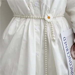 Pearl waist belt for women, delicate daisy flower buckle with hanging tassel chains chic.
