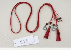 Handmade ethnic style red braided waist rope with tassels and beads for women dresses.