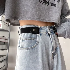 Vue détaillée de la ceinture invisible élastique, sangle de taille réglable pour jeans.