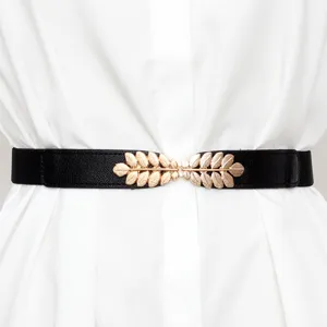 Ceinture élastique femme avec boucles dorées en feuilles noir minimaliste