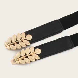 Ceinture de taille élastique noire avec détail de boucle en métal feuille dorée