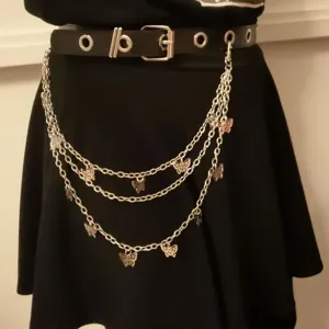 Multi-layer silver butterfly waist chain with black leather belt, punk hip-hop body jewelry.