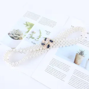 Ceinture élastique élégante en perles pour femme avec boucle de fleur en strass robe