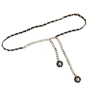 Women's luxury chain belt with leather weave and pearl flower charm for dresses and coats.