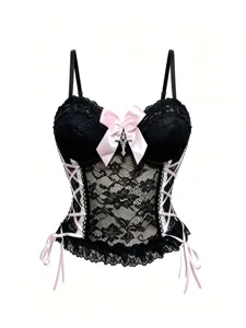 Schwarzes Spitzenkorsett Oberteil mit rosa Schleifen, verstellbaren Trägern und Kreuz.