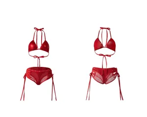 Close-up detail of the red halter mesh lingerie set featuring adjustable straps and metal studs.