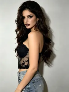 Close-up detail of the black mesh embroidered boned corset top paired with denim shorts.
