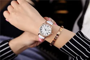 Women quartz watch white leather strap roman numerals diamond bezel detailed shot display