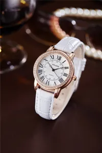 XINKON women quartz watch white leather strap rose gold rhinestone roman numerals chic