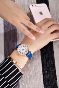 XINKON fashion rhinestone roman numeral quartz watch with blue leather strap for women