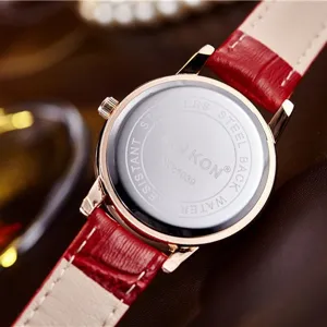 Women red leather strap quartz wristwatch with stainless steel back casual fashion timepiece.