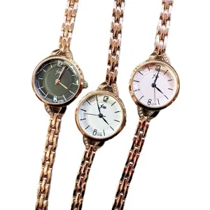 JW modische Damen Quarz Armbanduhr, elegante Roségold Metallkette, klares rundes Zifferblatt.
