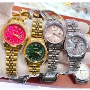 Fashion women quartz watch with steel strap and colorful dial, elegant daily wrist watch detail.