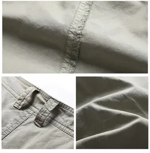 Detailed view of men casual cargo shorts stitching, belt loop, and washed fabric texture.