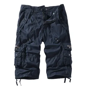 Close-up detail of men's cotton cargo capri shorts, multi-pocket casual loose trousers dark blue.