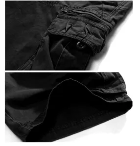 Detailed view of men's cotton multi-pocket cargo shorts featuring utility pockets and zipper.