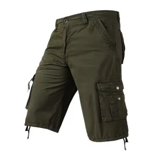 Detailed view of dark green cargo shorts with multiple side pockets and drawstrings.