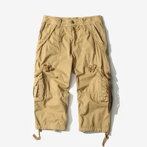 Men's khaki cargo 3/4 shorts loose multi-pocket casual tactical cropped pants apparel.