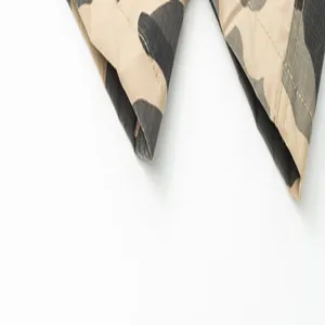 Men cargo pants detail closeup, camouflage pattern cotton fabric, durable tactical wear.