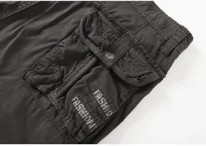 Close-up detail of men's casual cargo shorts featuring multi-pockets and durable fabric.