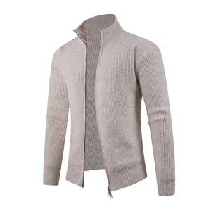 Detailed view of men's ribbed knit full-zip cardigan, textured fabric and stand-up collar.
