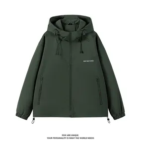 Men's dark green hooded jacket detail, loose fit with front zipper and pockets.