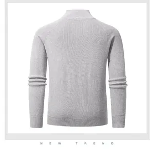 Detail shot of the men's half-zip ribbed knit sweater back, showing fine vertical texture.