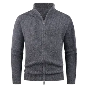 Close-up detail of dark grey men's ribbed knit zip cardigan sweater showcasing texture.