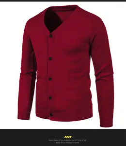 Close up view of men's slim fit V neck knitted cardigan showing fine button texture.