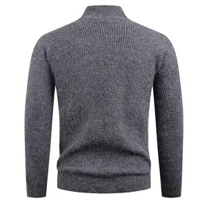 Back view detail of dark gray ribbed knit sweater, showing textured mock neck and sleeves.