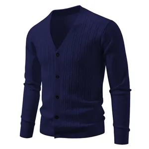 Men's deep blue V-neck knitted cardigan with button closure and classic cable knit design.