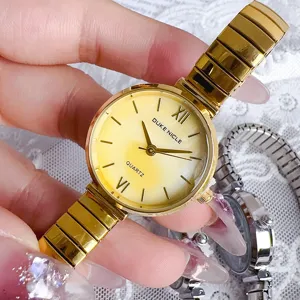 Orologio da polso al quarzo da donna dorato con quadrante in madreperla ed elastico