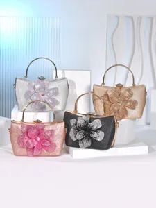 Elegant rhinestone evening bag with flower design, metal handle and strap for women parties.