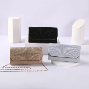 Glitter evening clutch bag for women, elegant pleated design with chain strap, perfect party bag.