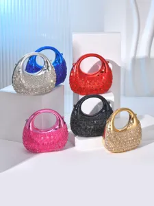 Detailed view of women crescent acrylic rhinestone mini evening handbag clutch with top handle.