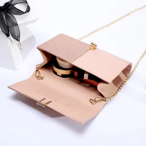 Elegant glitter patent leather evening clutch bag for women wedding party detail view.