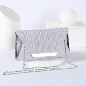 Silver glitter pleated evening clutch bag with metallic frame and chain strap for women.