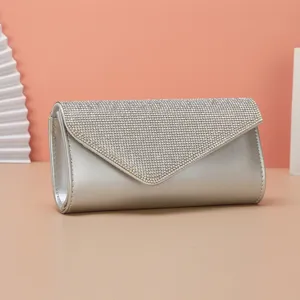 Sparkling rhinestone evening clutch bag, elegant silver PU leather party shoulder bag.