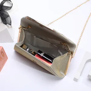 Elegant gold pleated glitter evening clutch bag with metal chain strap and clasp closure.