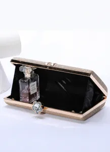 Elegant glitter clutch bag with stunning flower diamond clasp and metallic frame.